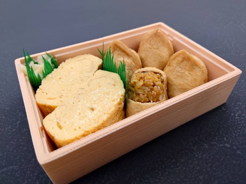 「カレーいなりだし巻弁当」1,080円(税込)