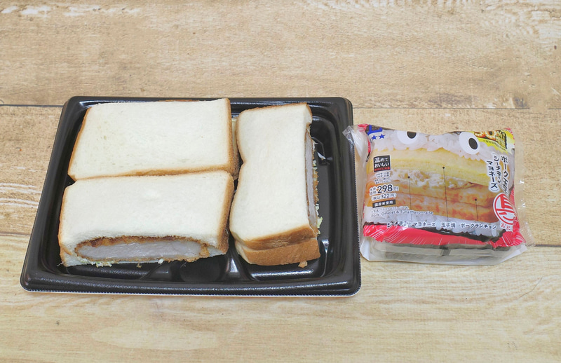 左が「盛りすぎ!厚切りロースカツサンド」、右が「盛りすぎ!具!おにぎり ポーク玉子(シーチキンマヨネーズ)」